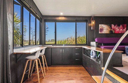 Tasman Apartamento | El estudio con vistas al agua.