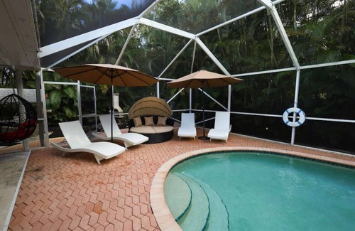 Greenacres Villa | The Utopia Resort Heated Pool Spa Waterfall BBQ Studio and more Hosted by Relaxtay
