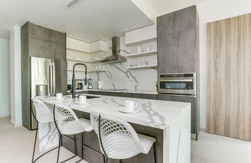 Cocoplum Condominio | The Villas at Cocoplum 'Ocelot' Apartment 122