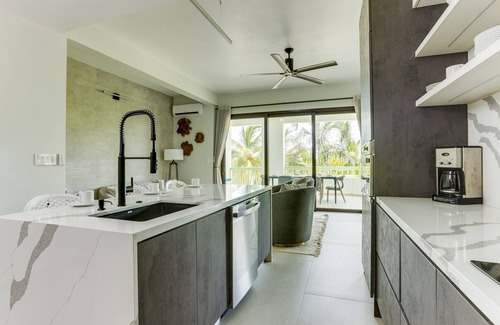 Cocoplum Condominio | The Villas at Cocoplum 'Whale Shark' Apartment 121
