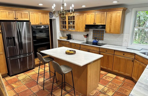 Bala-Cynwyd Casa | This 4 BR 4 BA sizable home with large outdoor porch & yard is ideal for a family visiting the area.