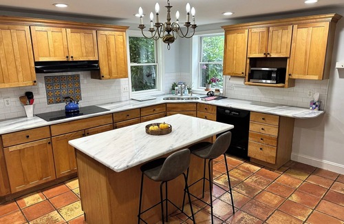 Bala-Cynwyd Casa | This 4 BR 4 BA sizable home with large outdoor porch & yard is ideal for a family visiting the area.