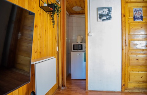 Busteni Apartamento | This apartment includes a seating area, a flat-screen TV with games console.