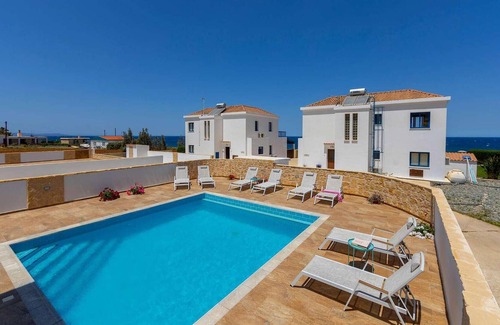 Pomos Casa | This fantastic, air-conditioned beachfront property is a perfect getaway for holiday makers wanting