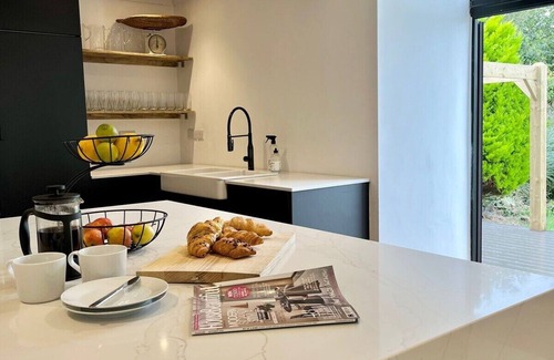 Bodorgan Casa | This historic, former public house has been transformed into a superb holiday residence