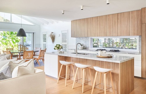 Palm Beach Casa | This home matches quaint beachside charm with luxurious comfort.