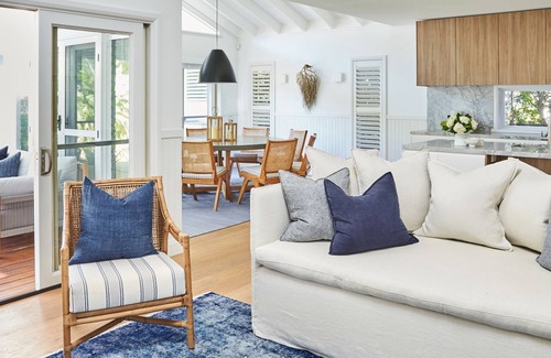 Palm Beach Casa | This home matches quaint beachside charm with luxurious comfort.