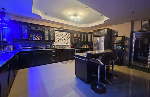 Claxton Bay Casa | This spacious property features a fully equipped kitchen, and an inviting small pool
