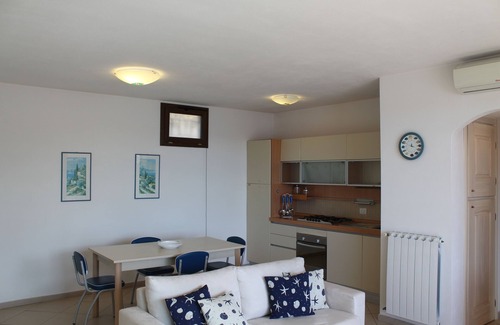 La Maddalena Apartamento | apartamento de tres habitaciones en un entorno tranquilo con vistas al mar terraza