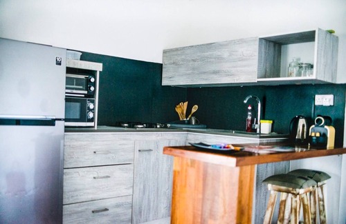 Tamarin Apartamento | Ti Lakaz un apartamento con jardín cerca del mar