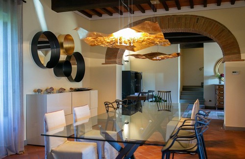 Puliciano Casa | Estancia vacacional atemporal en la Toscana