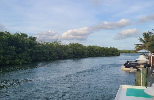 Key Largo Cabaña | Tiny home in Key Largo with Private Dock, Tiki Hut and Boat Lift