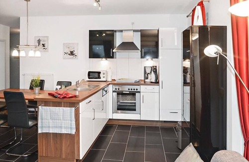 Schillig Apartamento | Tolles Ferienapartment an der Nordsee mit Südbalkon, Sauna und Whirlbadewanne