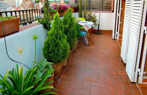 la Vila de Gracia Apartamento | Apartamento en la planta superior con terraza privada, en Gracia y a minutos de Downtow