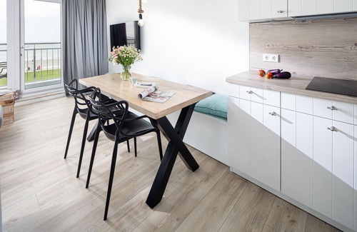 Norderney Apartamento | Apartamento de una habitación Kaiserhof 32 Norderney con vista al mar y piscina