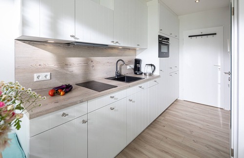 Norderney Apartamento | Apartamento de una habitación Kaiserhof 32 Norderney con vista al mar y piscina
