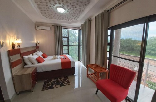 Kasane Cama Y Desayuno | Top Stay Inn