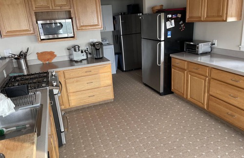 Mayfield Casa | Torch Lake home, south end of lake, sandy beach, mile-and-a-half from sand bar!