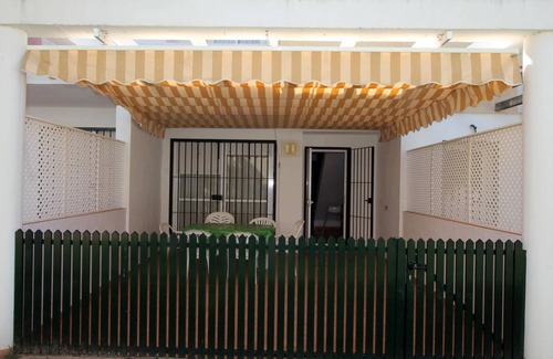 Poblado Sancti Petri Casa | Casa adosada cerca de la playa La Barrosa con piscina comunitaria