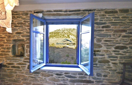 Kea Casa | Casa tradicional de piedra en Ioulis (Kea) con una vista fantástica.