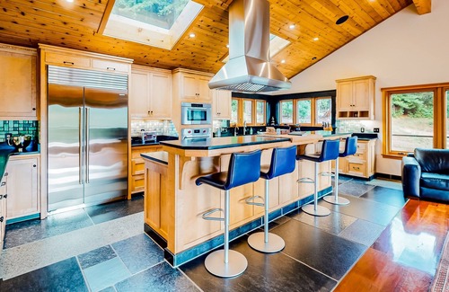 McKinleyville Casa | Tranquil and luxe river stay with wraparound deck, hot tub, sauna, & mtn views
