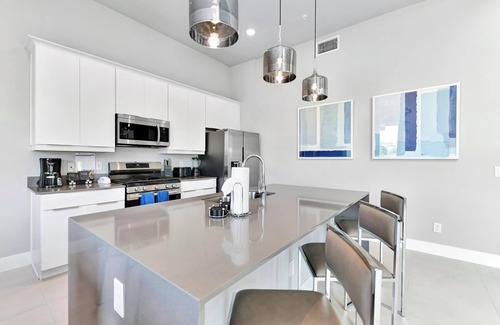 Reunion Hotel | Spacious Modern Condo with Pool Table, Rooftop Terrace and Large Loft. Reunion Resort Water Park Access near Disney at Spectrum Resort Orlando by Rentyl - B44 #241