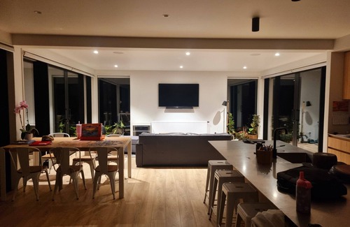 Dunedin Casa | Tree top and ocean views