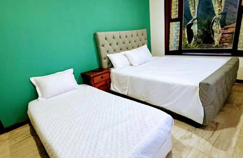Villa de Leyva Cama Y Desayuno | habitación triple vista montaña