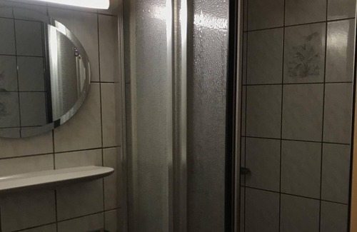 Hirschegg Casa | Triple room no. 7, shower/toilet - Gasthof Hirsch