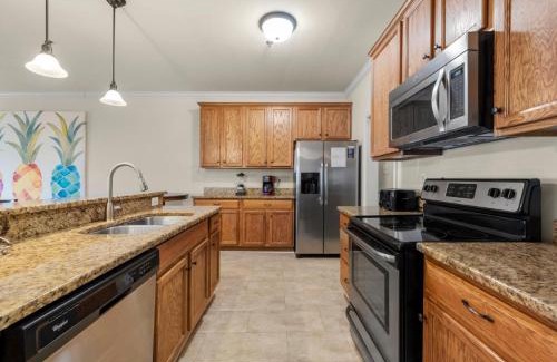 North Myrtle Beach Casa | Tropical Dunes I - 8 Bedroom Oceanfront Home - Private Pool Game Room and Elevator