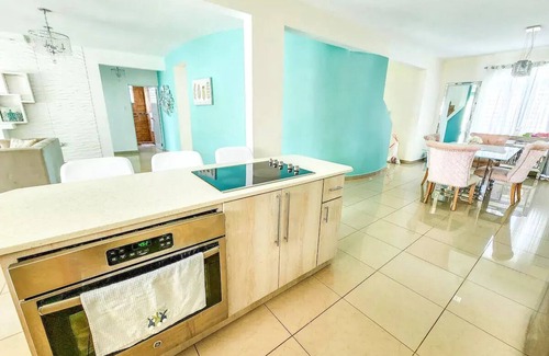 Aguadilla Casa | Tropical Retreat Stay-Spacious 5BR Oasis with Pool, Solar Backup, for 20 Guests!