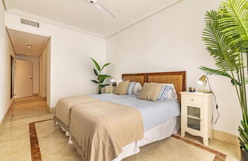 Sotogrande Apartamento | Tropical Sunset Paradise with Pool and Free Parking
