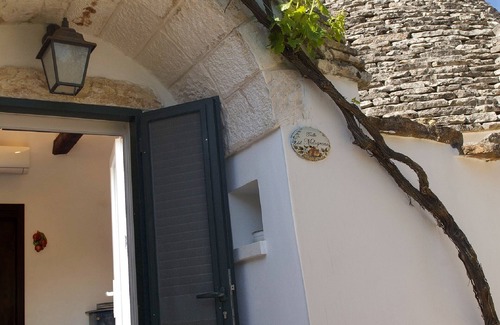 Martina Franca Casa | El Trullo del Melograno es una estructura acogedora y romántica para familias.