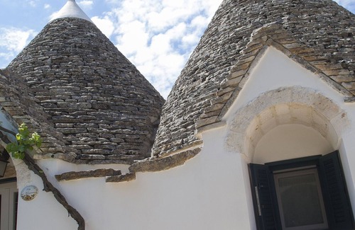Martina Franca Casa | El Trullo del Melograno es una estructura acogedora y romántica para familias.