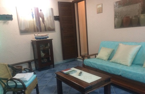 Trinita d'Agultu Villa | villa turquesa en el mar