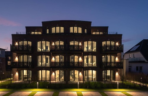 List Apartamento | Turtle Bay Suite - Luxury on 65m² in List, Sylt with a Fireplace and Balcony.