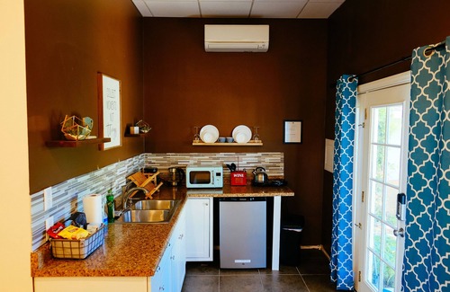 Bonita Casa | Turtle-themed tiny house with a turtle pond, hot tub, e-bikes, and EV charging