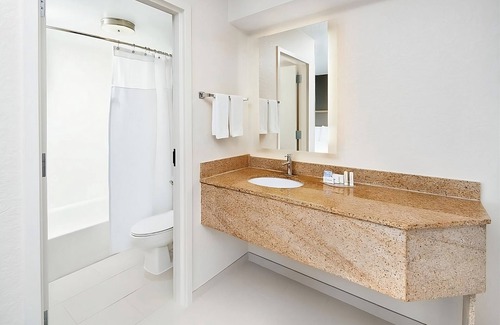 Southeast Houston Hotel | Two Family Ready Rooms w/ Living Area, Pool, and Daily Free Breakfast