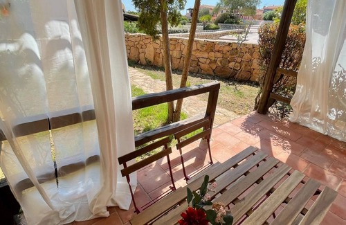 Porto Pollo Apartamento | Two-room apartment for 4 people with garden and patio located in the heart of Porto Pollo.