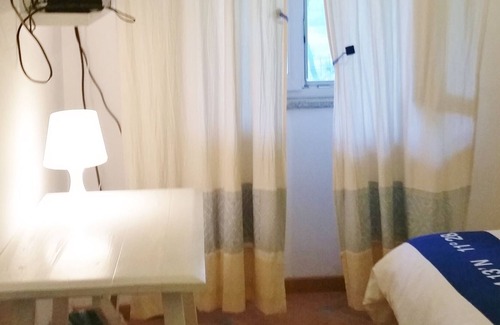 Tancau Sul Mare Apartamento | Apartamento a 300 metros del mar en villa con jardín