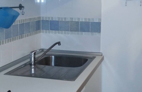 Tancau Sul Mare Apartamento | Apartamento a 300 metros del mar en villa con jardín
