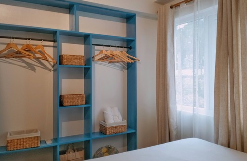 Guadalupe Apartamento | Two separate studio units on the same floor of a midrise condominium building.