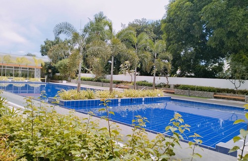Guadalupe Apartamento | Two separate studio units on the same floor of a midrise condominium building.
