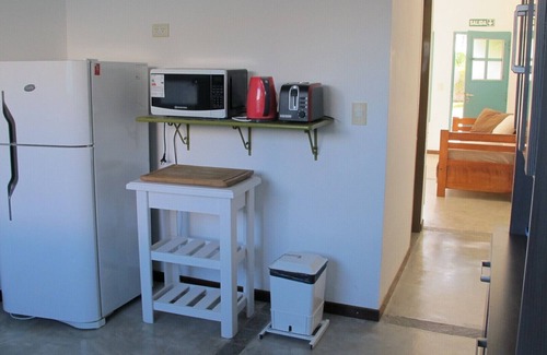 Puerto Madryn Apartamento | Two story apartment with all services and amenities. Nice neighbor