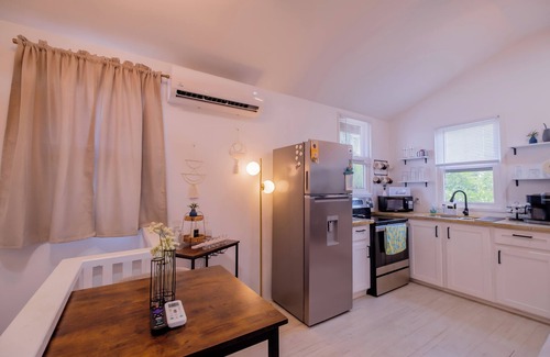 Caye Caulker Apartamento | Two story house with king size bed in beautiful Caye Caulker