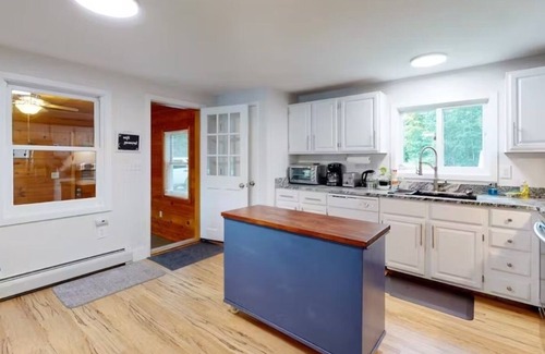 Alton Bay Casa | Two updated lakefront homes - dock with boat slip, game room, & screened porch