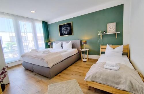 Ulm Apartamento | Ulmer Penthouse für 7, Arbeitsplatz, XXL-Dachterrasse, Grill, Wii