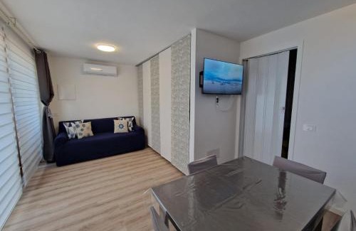 Cugnana Verde Apartamento | Una finestra vista mare in Costa Smeralda