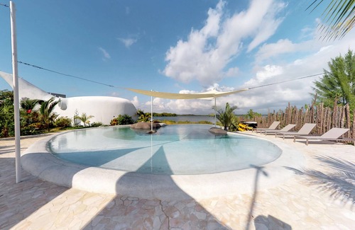 Cocoplum Apartamento | Estudio frente al mar apto para perros con servicios del resort que incluyen piscina compartida