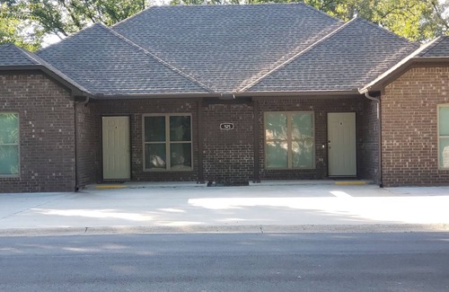 Conway Casa | Unit A- A charming 3-bedroom, 2-bathroom duplex offering a cozy atmosphere.